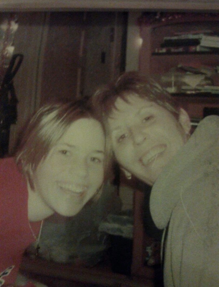 Axton age 12 left side, red shirt, mom right side grey sweater.