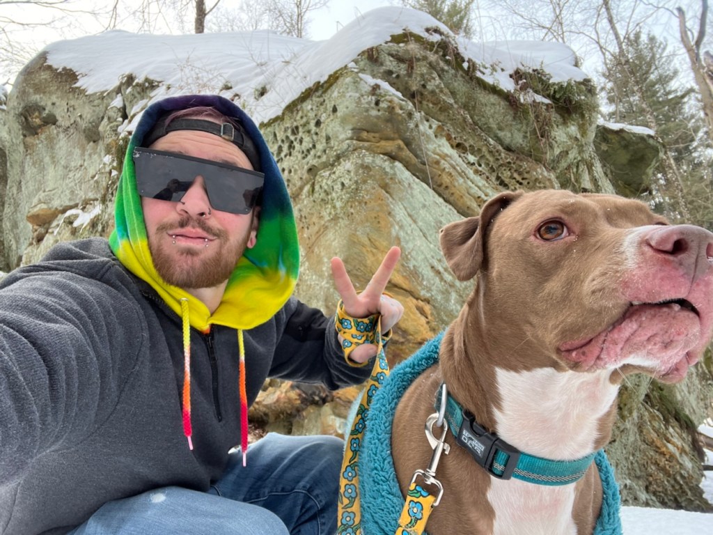 Hemlock Falls Trail Luna and Axton in front of a ledge