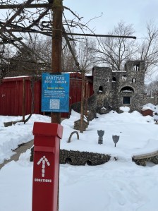 The school house and donation box surrounded by snow